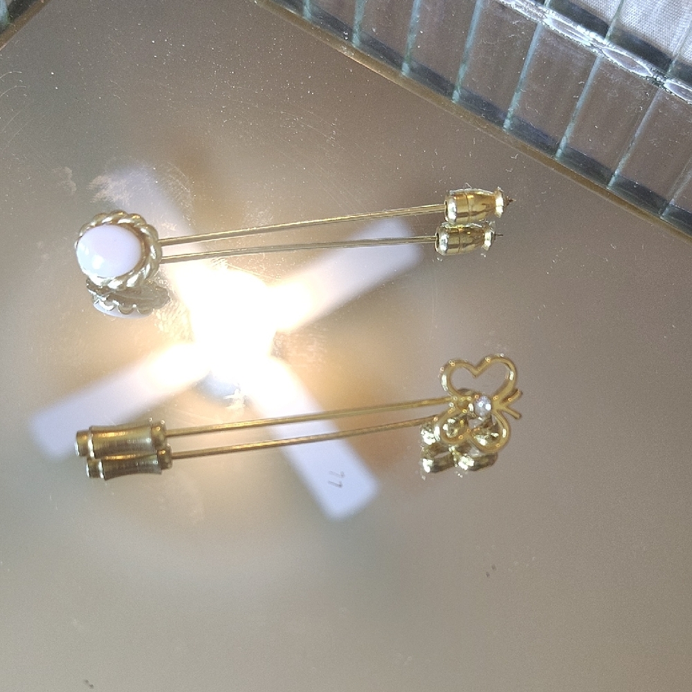 Elegant Gold and White Brooch Set